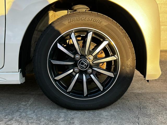 Ｎ－ＷＧＮカスタム Ｇ・Ｌパッケージ　ＥＴＣ　バックカメラ　ナビ　ＴＶ　オートクルーズコントロール　オートライト　ＨＩＤ　スマートキー　アイドリングストップ　ベンチシート　ＣＶＴ　盗難防止システム　ＡＢＳ　ＥＳＣ　ＣＤ　ＤＶＤ再生　ＵＳＢ（29枚目）