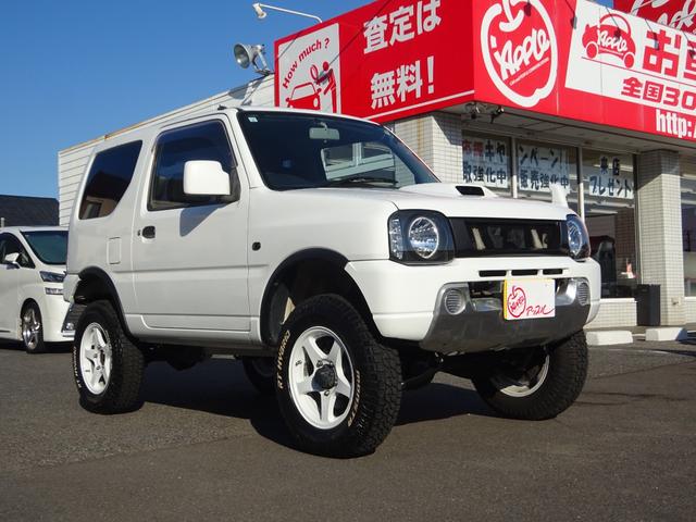 ジムニー ＸＧ　リフトアップ　社外ナビ　フルセグ　Ｂｌｕｅｔｏｏｔｈ対応　バックカメラ　社外ＥＴＣ　社外１６インチアルミ　ブロックタイヤ　ホワイトレター　社外マフラー　キーレスキー（4枚目）