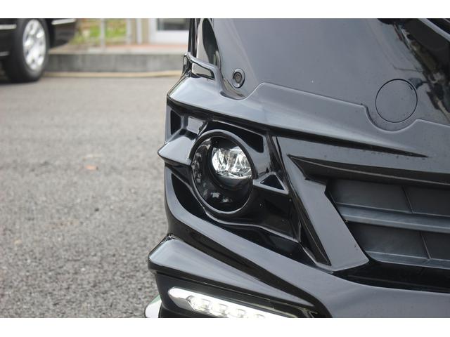 ヴェルファイアハイブリッド エグゼクティブラウンジ 禁煙車 フロントTRDエアロ サイド、リアモデリスタエアロ 純正10.5型JBLナビ 黒革シート 全周囲カメラ 後席モニター シートヒーター 衝突軽減ブレーキ パワーシート スマートキー(16枚目)