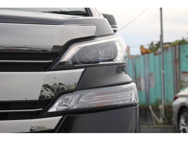 ヴェルファイアハイブリッド エグゼクティブラウンジ 禁煙車 フロントTRDエアロ サイド、リアモデリスタエアロ 純正10.5型JBLナビ 黒革シート 全周囲カメラ 後席モニター シートヒーター 衝突軽減ブレーキ パワーシート スマートキー(18枚目)