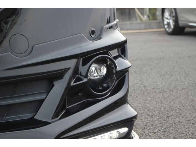 ヴェルファイアハイブリッド エグゼクティブラウンジ 禁煙車 フロントTRDエアロ サイド、リアモデリスタエアロ 純正10.5型JBLナビ 黒革シート 全周囲カメラ 後席モニター シートヒーター 衝突軽減ブレーキ パワーシート スマートキー(19枚目)