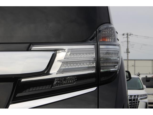 ヴェルファイアハイブリッド エグゼクティブラウンジ 禁煙車 フロントTRDエアロ サイド、リアモデリスタエアロ 純正10.5型JBLナビ 黒革シート 全周囲カメラ 後席モニター シートヒーター 衝突軽減ブレーキ パワーシート スマートキー(21枚目)