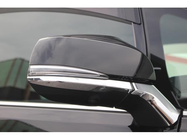 ヴェルファイアハイブリッド エグゼクティブラウンジ 禁煙車 フロントTRDエアロ サイド、リアモデリスタエアロ 純正10.5型JBLナビ 黒革シート 全周囲カメラ 後席モニター シートヒーター 衝突軽減ブレーキ パワーシート スマートキー(23枚目)