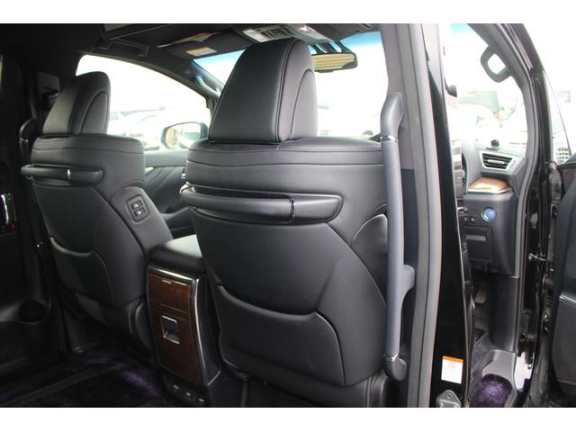 ヴェルファイアハイブリッド エグゼクティブラウンジ 禁煙車 フロントTRDエアロ サイド、リアモデリスタエアロ 純正10.5型JBLナビ 黒革シート 全周囲カメラ 後席モニター シートヒーター 衝突軽減ブレーキ パワーシート スマートキー(29枚目)