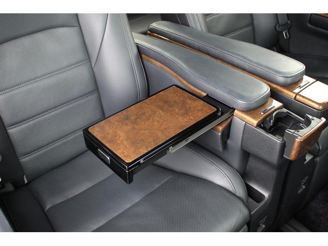 ヴェルファイアハイブリッド エグゼクティブラウンジ 禁煙車 フロントTRDエアロ サイド、リアモデリスタエアロ 純正10.5型JBLナビ 黒革シート 全周囲カメラ 後席モニター シートヒーター 衝突軽減ブレーキ パワーシート スマートキー(68枚目)