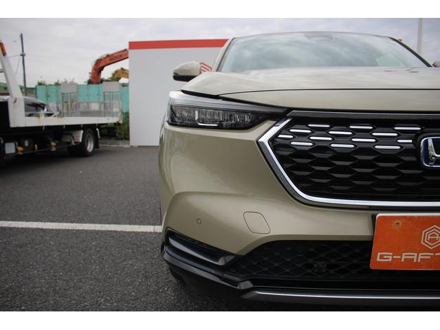 ヴェゼル e:HEV Z 禁煙車 純正9型ナビ バックカメラ フルセグTV 温熱黒半革 電動リアゲート レーダークルーズコントロール レーンキープアシスト 衝突軽減ブレーキ Applecarplay ステアリングヒーター 雹害(28枚目)