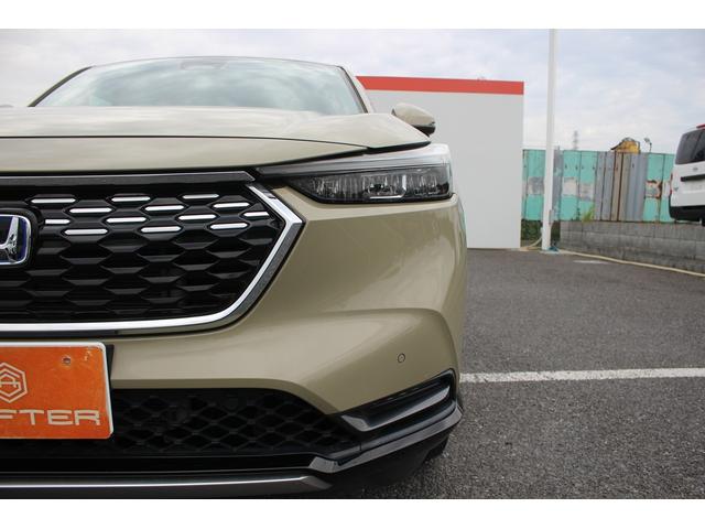 ヴェゼル e:HEV Z 禁煙車 純正9型ナビ バックカメラ フルセグTV 温熱黒半革 電動リアゲート レーダークルーズコントロール レーンキープアシスト 衝突軽減ブレーキ Applecarplay ステアリングヒーター 雹害(30枚目)