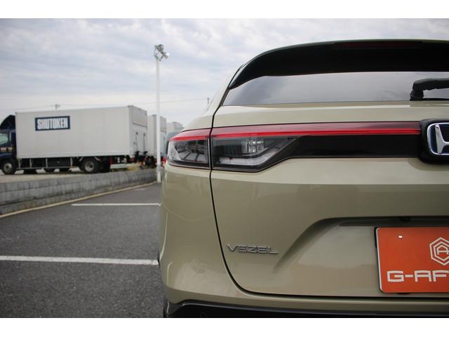 ヴェゼル e:HEV Z 禁煙車 純正9型ナビ バックカメラ フルセグTV 温熱黒半革 電動リアゲート レーダークルーズコントロール レーンキープアシスト 衝突軽減ブレーキ Applecarplay ステアリングヒーター 雹害(32枚目)