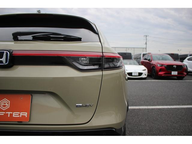 ヴェゼル e:HEV Z 禁煙車 純正9型ナビ バックカメラ フルセグTV 温熱黒半革 電動リアゲート レーダークルーズコントロール レーンキープアシスト 衝突軽減ブレーキ Applecarplay ステアリングヒーター 雹害(33枚目)