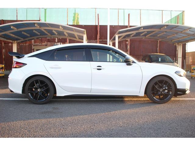 シビック ＲＳ　禁煙車　６ＭＴ　純正９インチナビ　フルセグＴＶ　バックカメラ　ＬＥＤヘッドライト　温熱黒半革　ＥＴＣ２．０　レーダークルーズコントロール　レーンキープアシスト　クリアランスソナー　ブラインドスポット（21枚目）