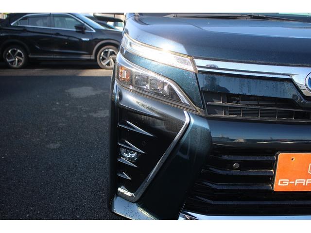ヴォクシー ハイブリッドＺＳ　煌ＩＩＩ　後期型　禁煙車　純正８インチナビ　フルセグＴＶ　バックカメラ　両側電動スライドドア　ＬＥＤヘッドライト　ＥＴＣ２．０　シートヒーター　クリアランスソナー　純正１６インチアルミホイール　オートクルコン（23枚目）
