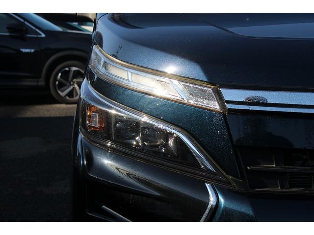 ヴォクシー ハイブリッドＺＳ　煌ＩＩＩ　後期型　禁煙車　純正８インチナビ　フルセグＴＶ　バックカメラ　両側電動スライドドア　ＬＥＤヘッドライト　ＥＴＣ２．０　シートヒーター　クリアランスソナー　純正１６インチアルミホイール　オートクルコン（24枚目）