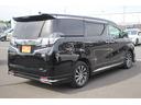 ヴェルファイアハイブリッド エグゼクティブラウンジ 禁煙車 フロントTRDエアロ サイド、リアモデリスタエアロ 純正10.5型JBLナビ 黒革シート 全周囲カメラ 後席モニター シートヒーター 衝突軽減ブレーキ パワーシート スマートキー(8枚目)
