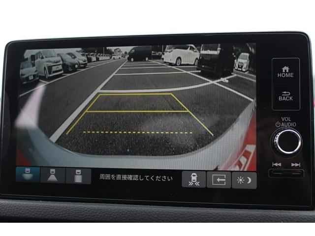 シビック ｅ：ＨＥＶ　ＢＯＳＥサウンド／純正９型ナビ／地デジ／バックカメラ／ホンダセンシング／ハーフレザーシート／パワーシート／ＥＴＣ２．０（4枚目）