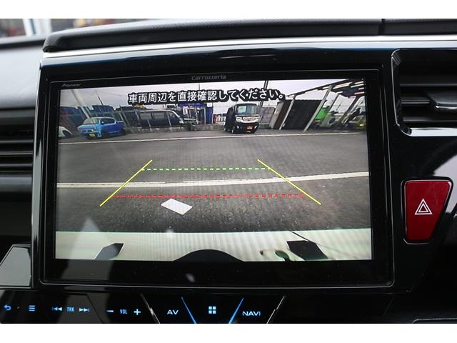 ステップワゴンスパーダ スパーダハイブリッド　Ｇ・ＥＸ　ホンダセンシング　社外９型ナビ／バックカメラ／両側電動／衝突軽減ブレーキ／レーダークルーズコントロール／ＬＥＤヘッドライト／ＥＴＣ／シートヒーター／（4枚目）