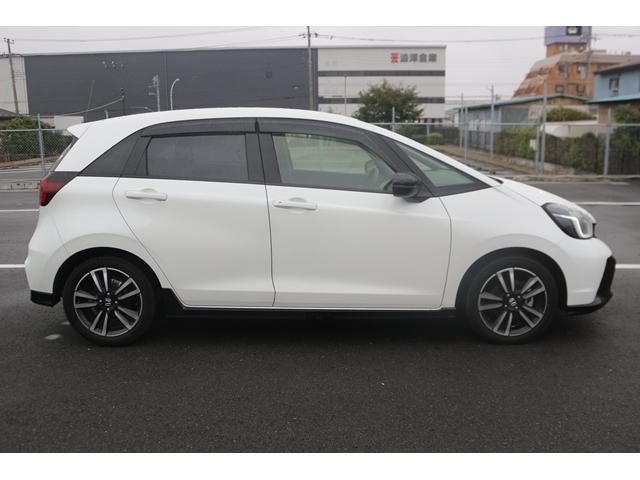 フィット e:HEV RS 禁煙車 純正9型ナビ 地デジ バックカメラ レーダークルーズ ホンダセンシング ETC LEDヘッドライト 純正16AW Bluetooth接続 イエローステッチ入革巻きハンドル(5枚目)
