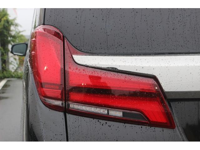 アルファード ２．５Ｓ　タイプゴールド　禁煙車　モデリスタエアロ　シグネチャーイルミ　後席モニター　３眼ＬＥＤヘッドライト　純正９型ナビ　バックカメラ　ＤＶＤデッキ　衝突軽減　電動リヤゲート　両側電動スライドドア　レーダークルーズ（28枚目）