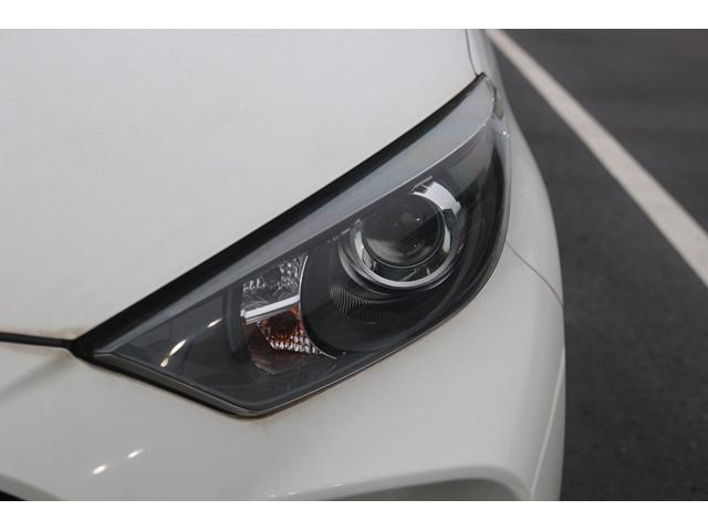 ヤリス ハイブリッドX 禁煙車 インテリジェントクリアランスソナー バックカメラ 純正ナビ セーフティセンス レーダークルーズ オートエアコン レーントレーシングアシスト ETC キーレス オートライト オートハイビーム(19枚目)