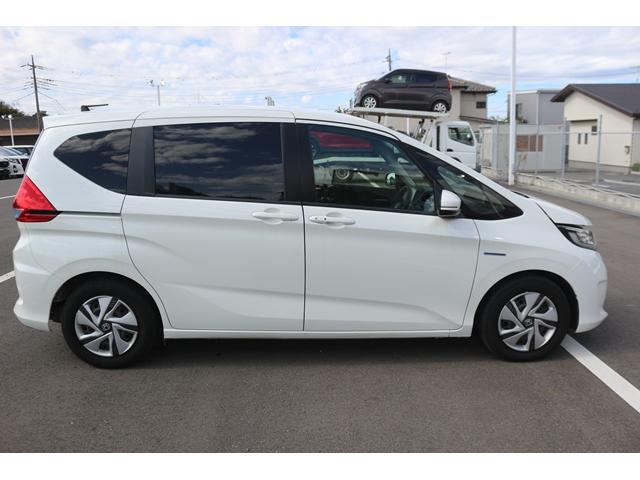 フリード+ハイブリッド ハイブリッドG・ホンダセンシング ワンオーナー 禁煙車 純正ナビ フルセグ バックカメラ 両側電動 レーダークルーズ 衝突軽減 LEDヘッドライト キーレス CD再生可 DVD再生可 BT接続可 キーレス プライバシーガラス(10枚目)