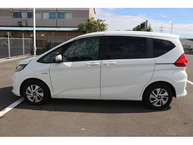 フリード+ハイブリッド ハイブリッドG・ホンダセンシング ワンオーナー 禁煙車 純正ナビ フルセグ バックカメラ 両側電動 レーダークルーズ 衝突軽減 LEDヘッドライト キーレス CD再生可 DVD再生可 BT接続可 キーレス プライバシーガラス(14枚目)