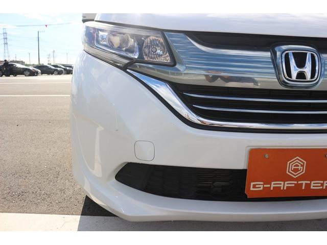 フリード+ハイブリッド ハイブリッドG・ホンダセンシング ワンオーナー 禁煙車 純正ナビ フルセグ バックカメラ 両側電動 レーダークルーズ 衝突軽減 LEDヘッドライト キーレス CD再生可 DVD再生可 BT接続可 キーレス プライバシーガラス(18枚目)