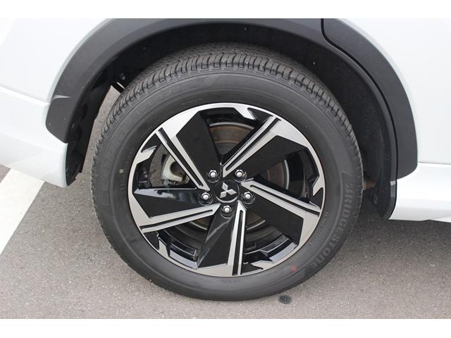 エクリプスクロスPHEV P 禁煙車 純正8型ナビ フルセグTV 全周囲カメラ 衝突軽減 レーダクルーズ シートヒーター ハーフレザーシート LEDヘッドライト パワーシート 純正18AW スマートキー アイドリングストップ(32枚目)