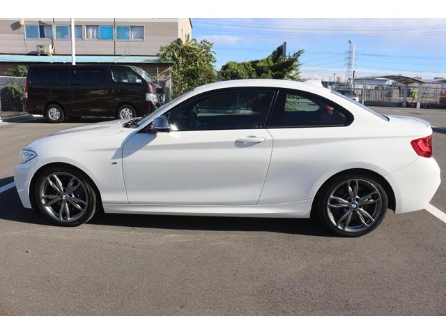 2シリーズ M235iクーペ 禁煙車 harman/kardon 赤革シート 前席シートヒーター ドライビングアシスト 専用18インチAW 純正HDDナビ バックカメラ メモリー機能付パワーシート パドルシフト レーンキープ(11枚目)