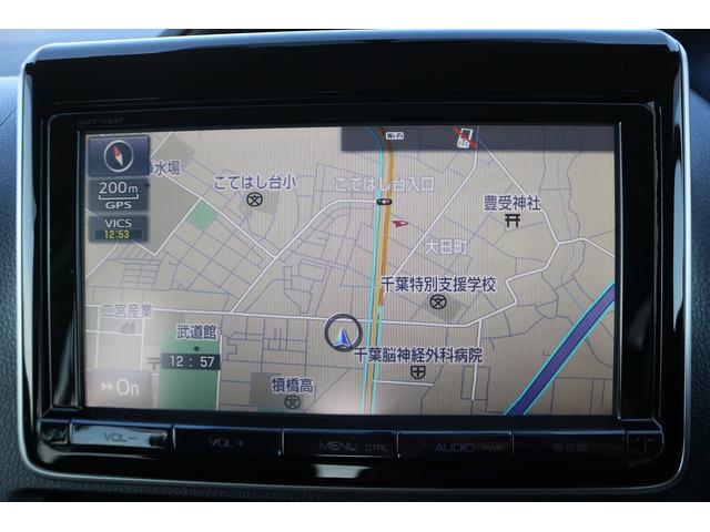 ヴォクシー ZS 禁煙車 純正9インチナビ 後席モニター 両側電動スライド バックカメラ フルセグ LEDヘッドライト ETC ウォークスルー オートライト 電動格納ミラー スマートキー Bluetooth接続(3枚目)