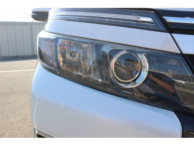 ヴォクシー ZS 禁煙車 純正9インチナビ 後席モニター 両側電動スライド バックカメラ フルセグ LEDヘッドライト ETC ウォークスルー オートライト 電動格納ミラー スマートキー Bluetooth接続(19枚目)