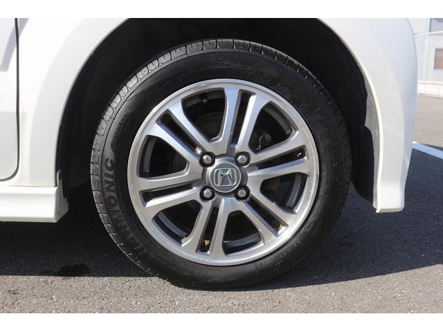 Ｎ－ＢＯＸカスタム Ｇ・Ｌパッケージ　禁煙車　ナビ　フルセグＴＶ　電動スライドドア　ＥＴＣ　プッシュスタート　電動格納ドアミラー　オートライト　ＨＩＤライト　ドアバイザー　アイドリングストップ　Ｂｌｕｅｔｏｏｔｈ接続　純正１４インチＡＷ（19枚目）