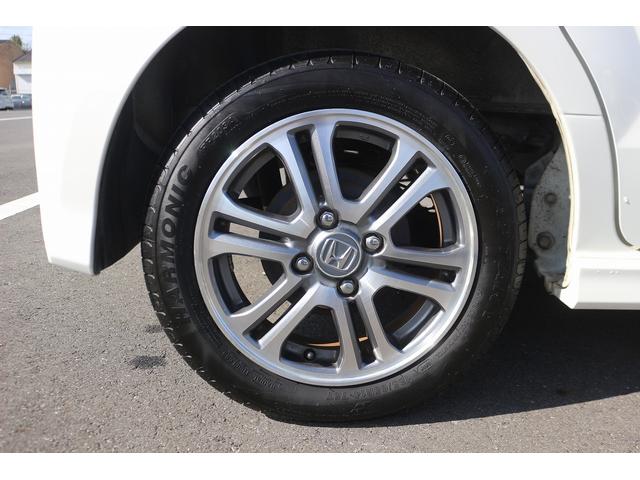 Ｎ－ＢＯＸカスタム Ｇ・Ｌパッケージ　禁煙車　ナビ　フルセグＴＶ　電動スライドドア　ＥＴＣ　プッシュスタート　電動格納ドアミラー　オートライト　ＨＩＤライト　ドアバイザー　アイドリングストップ　Ｂｌｕｅｔｏｏｔｈ接続　純正１４インチＡＷ（20枚目）