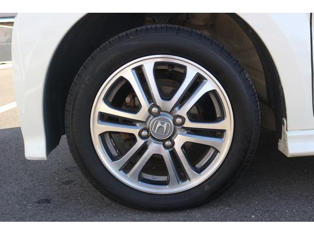 Ｎ－ＢＯＸカスタム Ｇ・Ｌパッケージ　禁煙車　ナビ　フルセグＴＶ　電動スライドドア　ＥＴＣ　プッシュスタート　電動格納ドアミラー　オートライト　ＨＩＤライト　ドアバイザー　アイドリングストップ　Ｂｌｕｅｔｏｏｔｈ接続　純正１４インチＡＷ（22枚目）