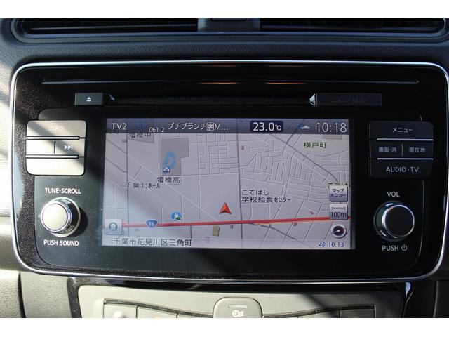 リーフ X 禁煙車 純正ナビ フルセグTV バックカメラ 衝突軽減 オ-トクル-ズコントロ-ル ETC シ-トヒ-タ- 電動格納ドアミラ- ハロゲン 社外16AW スマ-トキ- DVD再生 ESC(3枚目)