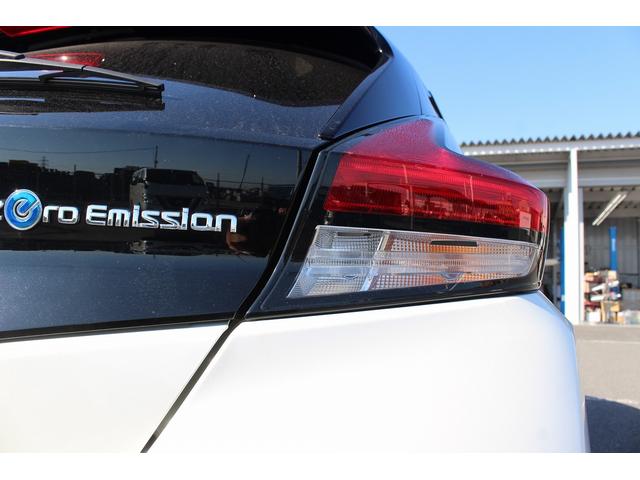 リーフ X 禁煙車 純正ナビ フルセグTV バックカメラ 衝突軽減 オ-トクル-ズコントロ-ル ETC シ-トヒ-タ- 電動格納ドアミラ- ハロゲン 社外16AW スマ-トキ- DVD再生 ESC(14枚目)