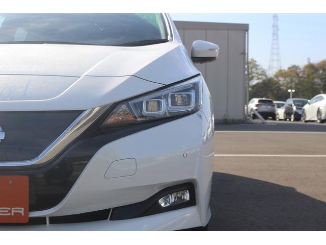 リーフ Ｘ　１０万台記念車　禁煙車　プロパイロット　純正ナビ　フルセグＴＶ　バックカメラ　衝突軽減　ＬＥＤヘッドライト　ＥＴＣ　シートヒ－タ－　　ブラインドスポットモニタ－　スマ－トキ－　純正１６ＡＷ　電動格納ミラ－（18枚目）