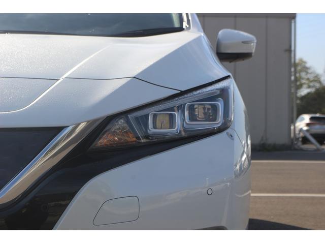 リーフ Ｘ　１０万台記念車　禁煙車　プロパイロット　純正ナビ　フルセグＴＶ　バックカメラ　衝突軽減　ＬＥＤヘッドライト　ＥＴＣ　シートヒ－タ－　　ブラインドスポットモニタ－　スマ－トキ－　純正１６ＡＷ　電動格納ミラ－（19枚目）