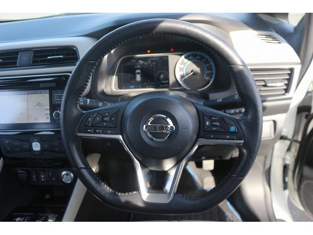 リーフ Ｘ　１０万台記念車　禁煙車　プロパイロット　純正ナビ　フルセグＴＶ　バックカメラ　衝突軽減　ＬＥＤヘッドライト　ＥＴＣ　シートヒ－タ－　　ブラインドスポットモニタ－　スマ－トキ－　純正１６ＡＷ　電動格納ミラ－（46枚目）