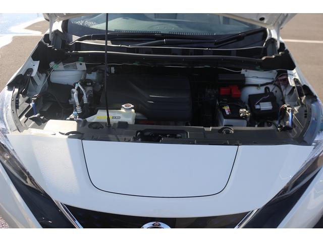 リーフ Ｘ　１０万台記念車　禁煙車　プロパイロット　純正ナビ　フルセグＴＶ　バックカメラ　衝突軽減　ＬＥＤヘッドライト　ＥＴＣ　シートヒ－タ－　　ブラインドスポットモニタ－　スマ－トキ－　純正１６ＡＷ　電動格納ミラ－（72枚目）