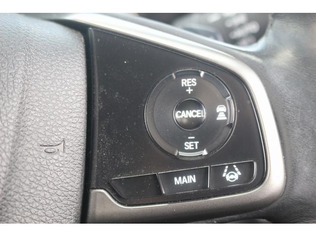 シビック ハッチバック　禁煙車　黒革シート　純正ナビ　フルセグＴＶ　バックカメラ　レーダークルーズコントロール　衝突軽減ブレーキ　ＬＥＤヘッドライト　シートヒーター　パワーシート　アイドリングストップ　電動格納ドアミラー（5枚目）