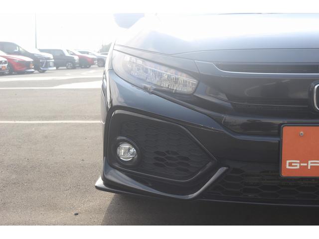 シビック ハッチバック　禁煙車　黒革シート　純正ナビ　フルセグＴＶ　バックカメラ　レーダークルーズコントロール　衝突軽減ブレーキ　ＬＥＤヘッドライト　シートヒーター　パワーシート　アイドリングストップ　電動格納ドアミラー（15枚目）