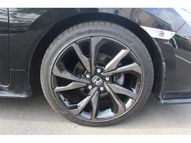 シビック ハッチバック　禁煙車　黒革シート　純正ナビ　フルセグＴＶ　バックカメラ　レーダークルーズコントロール　衝突軽減ブレーキ　ＬＥＤヘッドライト　シートヒーター　パワーシート　アイドリングストップ　電動格納ドアミラー（23枚目）