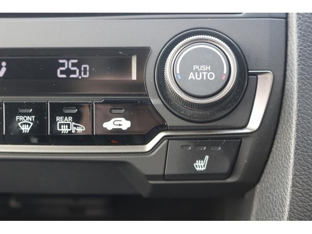 シビック ハッチバック　禁煙車　黒革シート　純正ナビ　フルセグＴＶ　バックカメラ　レーダークルーズコントロール　衝突軽減ブレーキ　ＬＥＤヘッドライト　シートヒーター　パワーシート　アイドリングストップ　電動格納ドアミラー（41枚目）