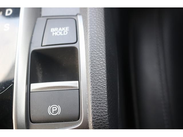 シビック ハッチバック　禁煙車　黒革シート　純正ナビ　フルセグＴＶ　バックカメラ　レーダークルーズコントロール　衝突軽減ブレーキ　ＬＥＤヘッドライト　シートヒーター　パワーシート　アイドリングストップ　電動格納ドアミラー（43枚目）