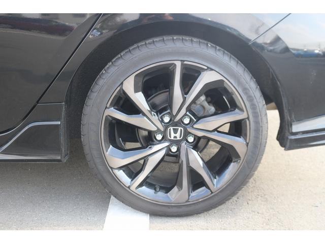 シビック ハッチバック　禁煙車　黒革シート　純正ナビ　フルセグＴＶ　バックカメラ　レーダークルーズコントロール　衝突軽減ブレーキ　ＬＥＤヘッドライト　シートヒーター　パワーシート　アイドリングストップ　電動格納ドアミラー（60枚目）