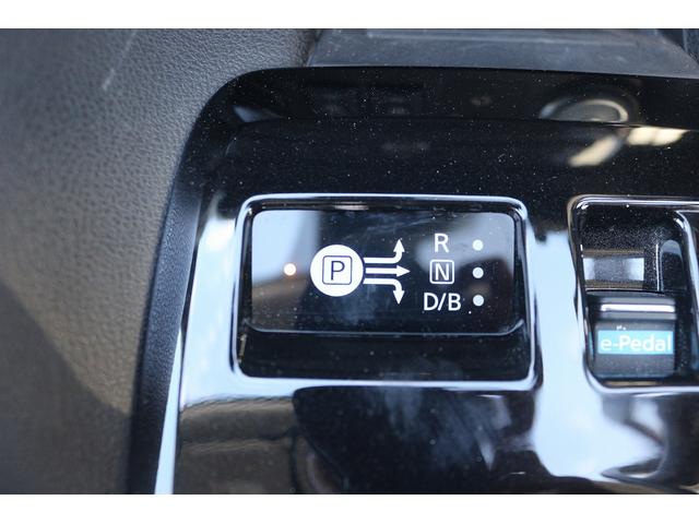 リーフ X 禁煙車 ツートンルーフ LEDヘッドライト 純正ナビ バックカメラ フルセグTV 衝突軽減 クルーズコントロール シートヒーター ETC ステアリングヒーター 電動格納ミラー Bluetooth接続(56枚目)