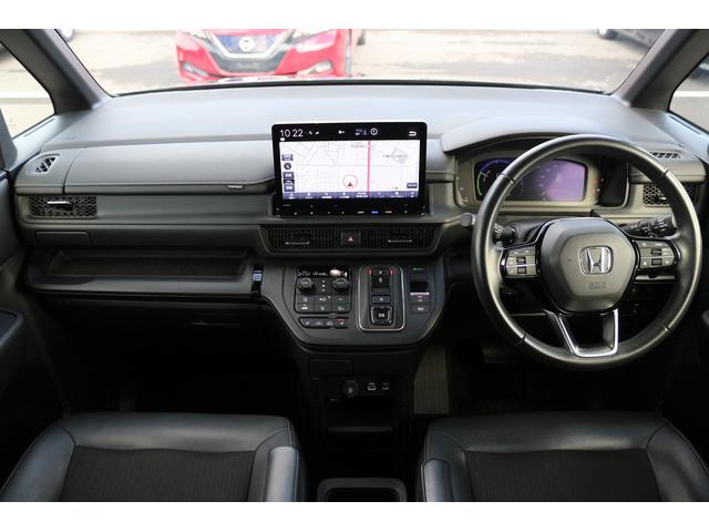 ステップワゴン ｅ：ＨＥＶスパーダ　禁煙車　７人乗り　純正１１．４型ナビ　後席モニター　フルセグＴＶ　バックカメラ　両側電動スライドドア　レーダークルーズコントロール　衝突軽減ブレーキ　ブラインドスポットモニター（55枚目）
