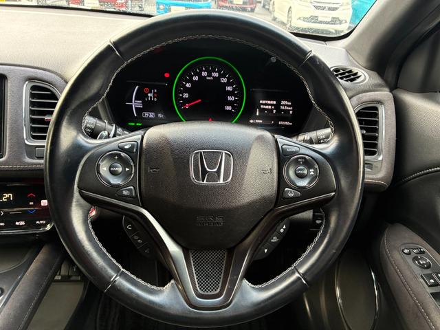 ヴェゼル ハイブリッドＲＳ・ホンダセンシング　衝突軽減ブレーキ　レーンアシスト　純正ナビ　フルセグ　ＣＤ　ＤＶＤ　ＢＴ接続　バックカメラ　スマートキー　プッシュスタート　ＥＴＣ　クルコン　Ｗエアコン　ヒートシーター　パドルシフト　オートライト（12枚目）