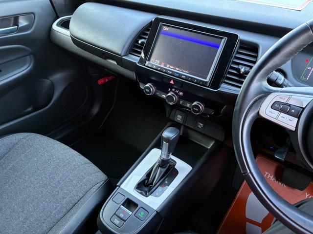 フィット e:HEVホーム 衝突軽減 レーンアシスト 純正ナビ CD DVD MSV Bluetooth接続 バックカメラ スマートキー ETC コーナーセンサー アダプティブクルコン LED オートハイビーム オートライト(20枚目)