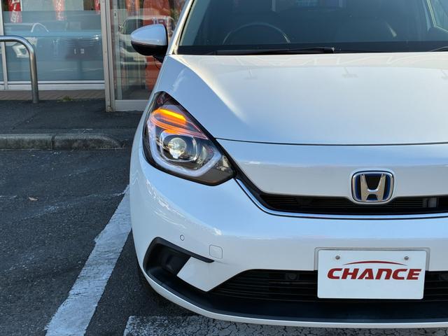 フィット e:HEVホーム 衝突軽減 レーンアシスト 純正ナビ CD DVD MSV Bluetooth接続 バックカメラ スマートキー ETC コーナーセンサー アダプティブクルコン LED オートハイビーム オートライト(42枚目)