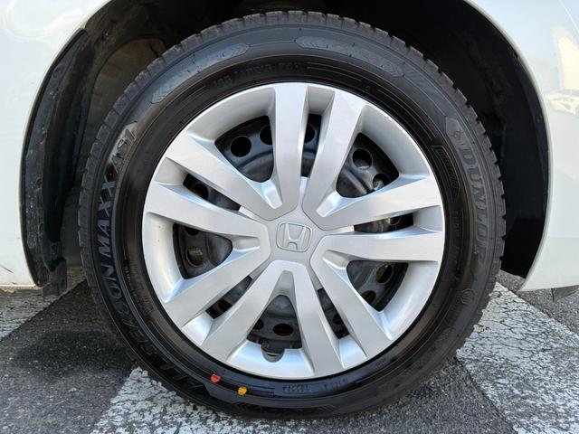 フィット e:HEVホーム 衝突軽減 レーンアシスト 純正ナビ CD DVD MSV Bluetooth接続 バックカメラ スマートキー ETC コーナーセンサー アダプティブクルコン LED オートハイビーム オートライト(49枚目)